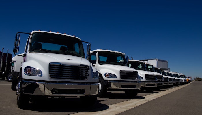 07.20.Medium-duty trucks on lot outside