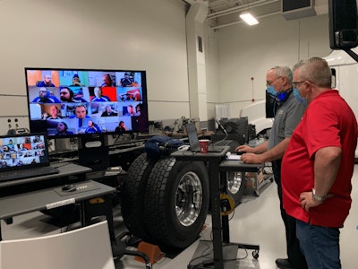 DTNA Technician Skills Competition judges collaborating online with participants.