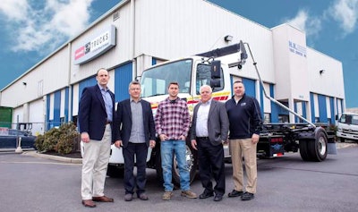 Members of the HK Truck Center family in front of its South Plainfield, N.J., headquarters. The company added its second location last year.