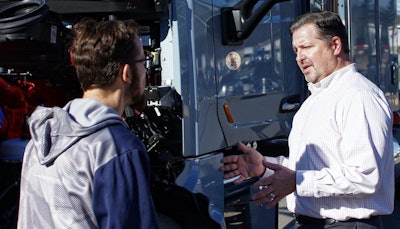 Hunter Truck Sales Rep Talking To Customer