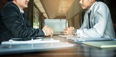 Shutterstock Businessmen Face To Face