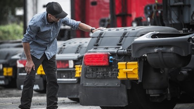 Shutterstock Customer Inspecting Truck