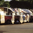 Semi-trucks parked in a row