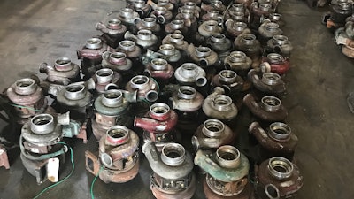 turbochargers sitting on a warehouse floor