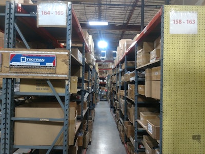aisle of boxes in a warehouse
