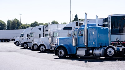 Shutterstock Trucks In Lot