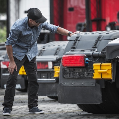 Shutterstock Customer Inspecting Truck