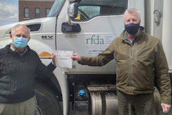 Volker Kromm, executive director of the Regional Food Distribution Association (on left) accepts a $5,000 donation cheque from Darrin Poulin, general manager of Maxim Truck & Trailer’s Thunder Bay branch office.