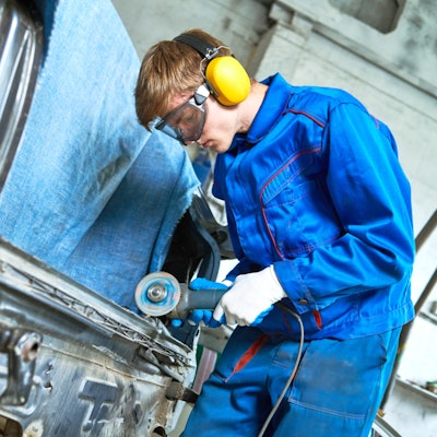 Shutterstock Technician Repairing=truck