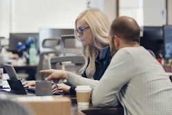 Solera Colleagues At Computer