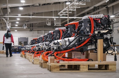 Assembled electric powertrains ready for installation into Lightning Electric Transit 350HD vehicles
