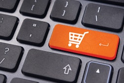 Computer keyboard with a key that has a shopping cart.