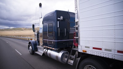 Truck and trailer on highway