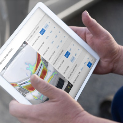 Technician using CCC estimator tool