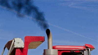 Emissions smoke from truck