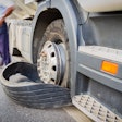 Truck with flat tire roadside