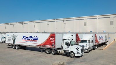 FleetPride trucks at warehouse.