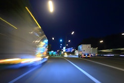Stylized image of trucks driving
