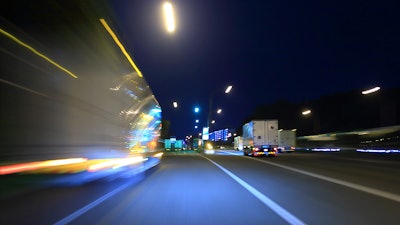 Stylized image of trucks driving