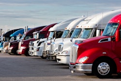 Trucks parked in a lot.