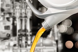 Pouring oil out of bottle