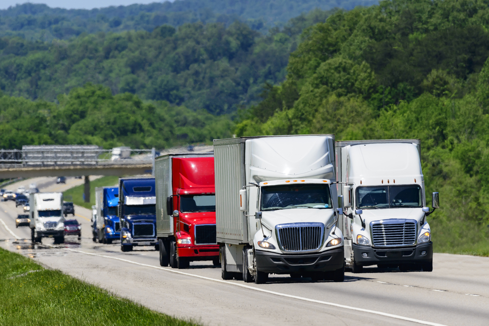 Trucks driving on the expressway.