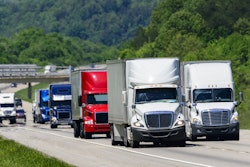 Trucks driving on the expressway.