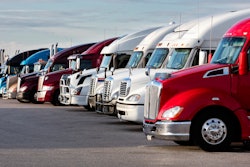 Trucks parked in a lot.