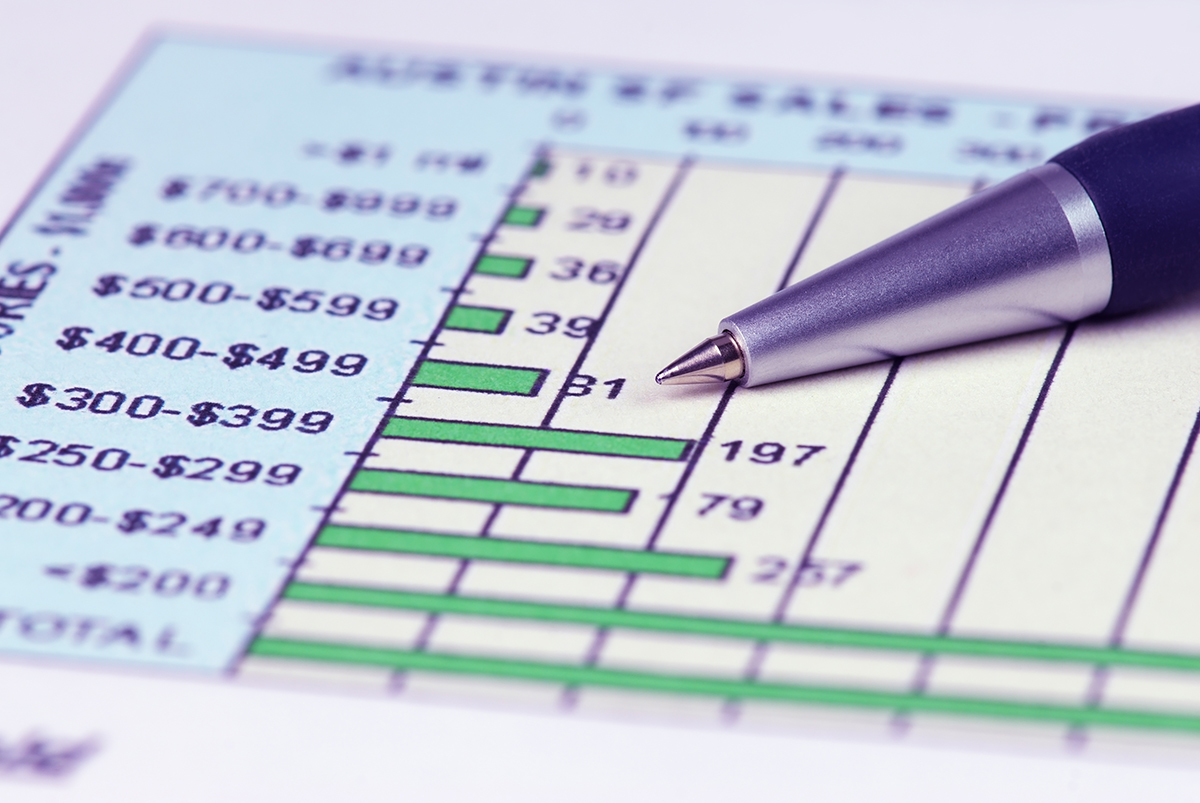 Image of spreadsheet and pen
