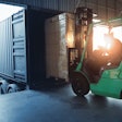 forklift loading a trailer