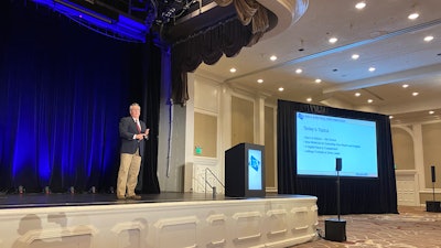 Charles Bowles speaking at UTA