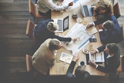 Executives at meeting table