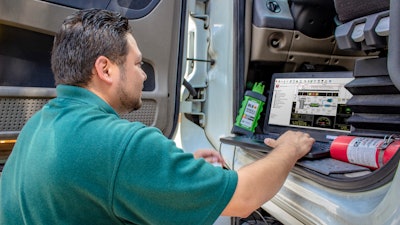 Technician using Noregon Systems' JPRO