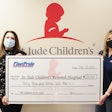 Victoria Roberts of FleetPride presenting Amy Weidner of St. Jude Children’s Research Hospital a check for $30,0000.