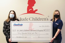 Victoria Roberts of FleetPride presenting Amy Weidner of St. Jude Children’s Research Hospital a check for $30,0000.