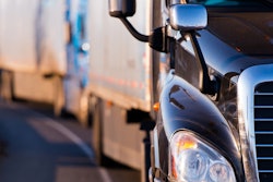 Several trucks on roadway