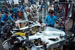 Workers in manufacturing facility