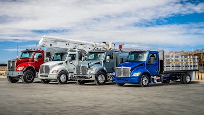 Kenworth trucks in a row