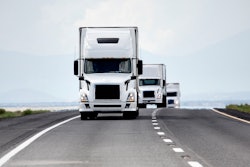 Three trucks on roadway