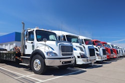Line of trucks on a summer day