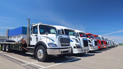 Line of trucks on a summer day