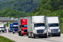 Several trucks on roadway