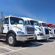 Line of commercial trucks