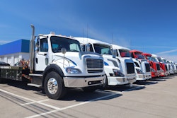 Line of commercial trucks