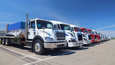Line of commercial trucks