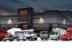 Rush Truck Center with trucks in front