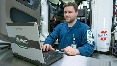 ASE technician using Noregon tools