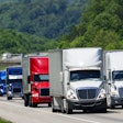 A variety of Class 8 trucks on the highway
