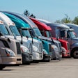 Class 8 trucks parked in row