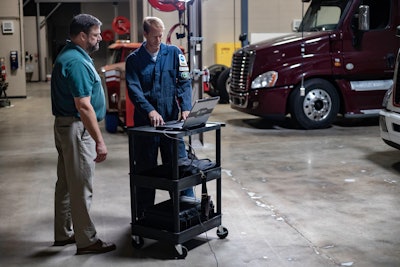 Noregon technicians using J-PRO in a service shop